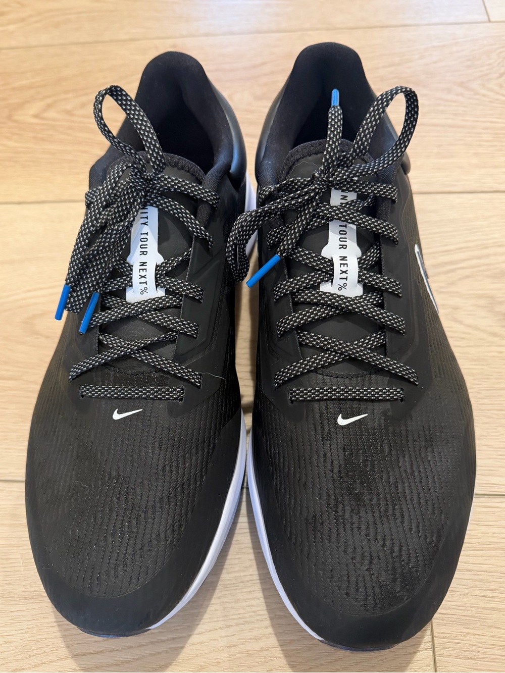 Nike Men's Black and White Golf Shoes with Blue Accents